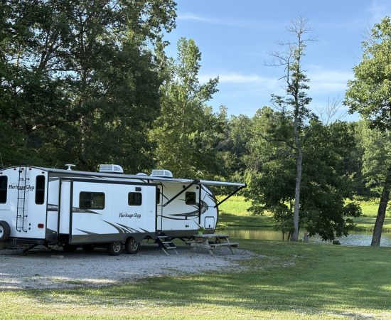 RV Camping by the Pond at Woods-N-Waters Campground Spacious RV campsite overlooking the pond at Woods-N-Waters Campground in Columbus, Indiana